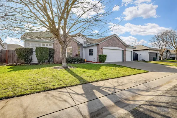 a house with trees in the background