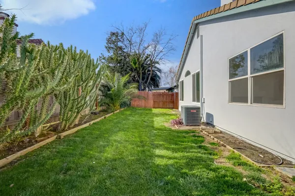 a house view with a garden space