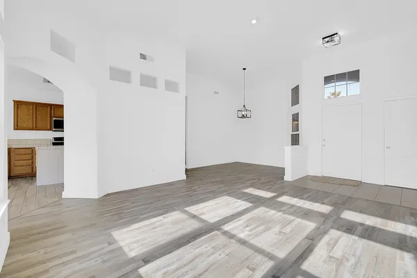 a view of a livingroom with wooden floor