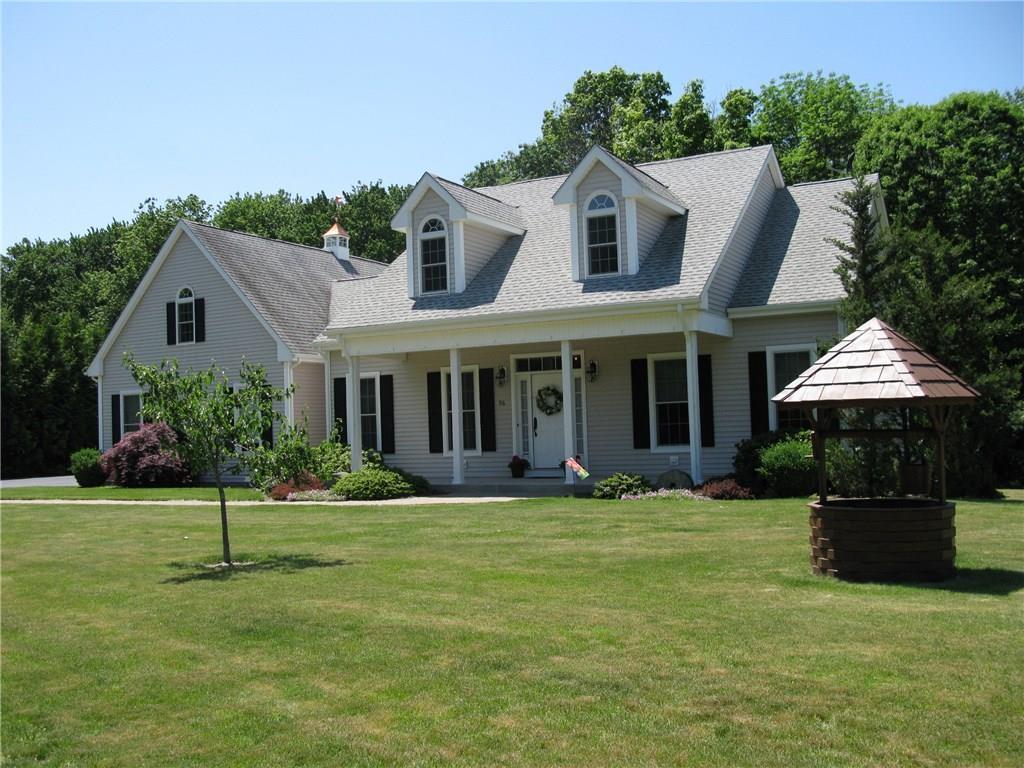 96 Whisper Wind Road Middlefield, CT 06455 - Photo 1 of 1 a view of a house with a yard and potted plants