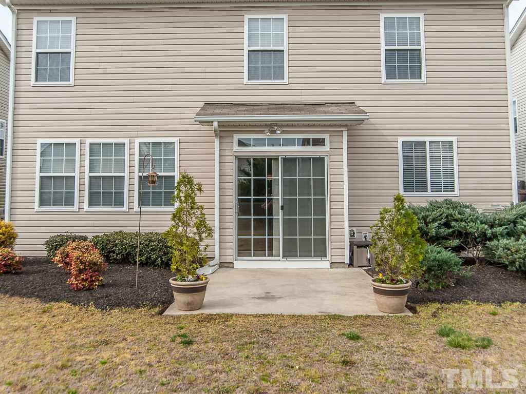 6040 Ricker Road Raleigh, NC 27610 - Photo 23 of 25 a front view of a house