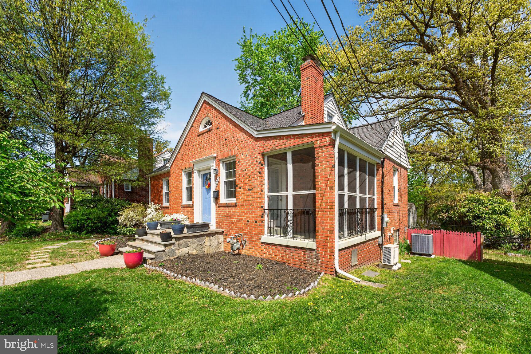 617 Gist Avenue Silver Spring, MD 20910 - Photo 25 of 31 Screened-in porch and gate to back yard