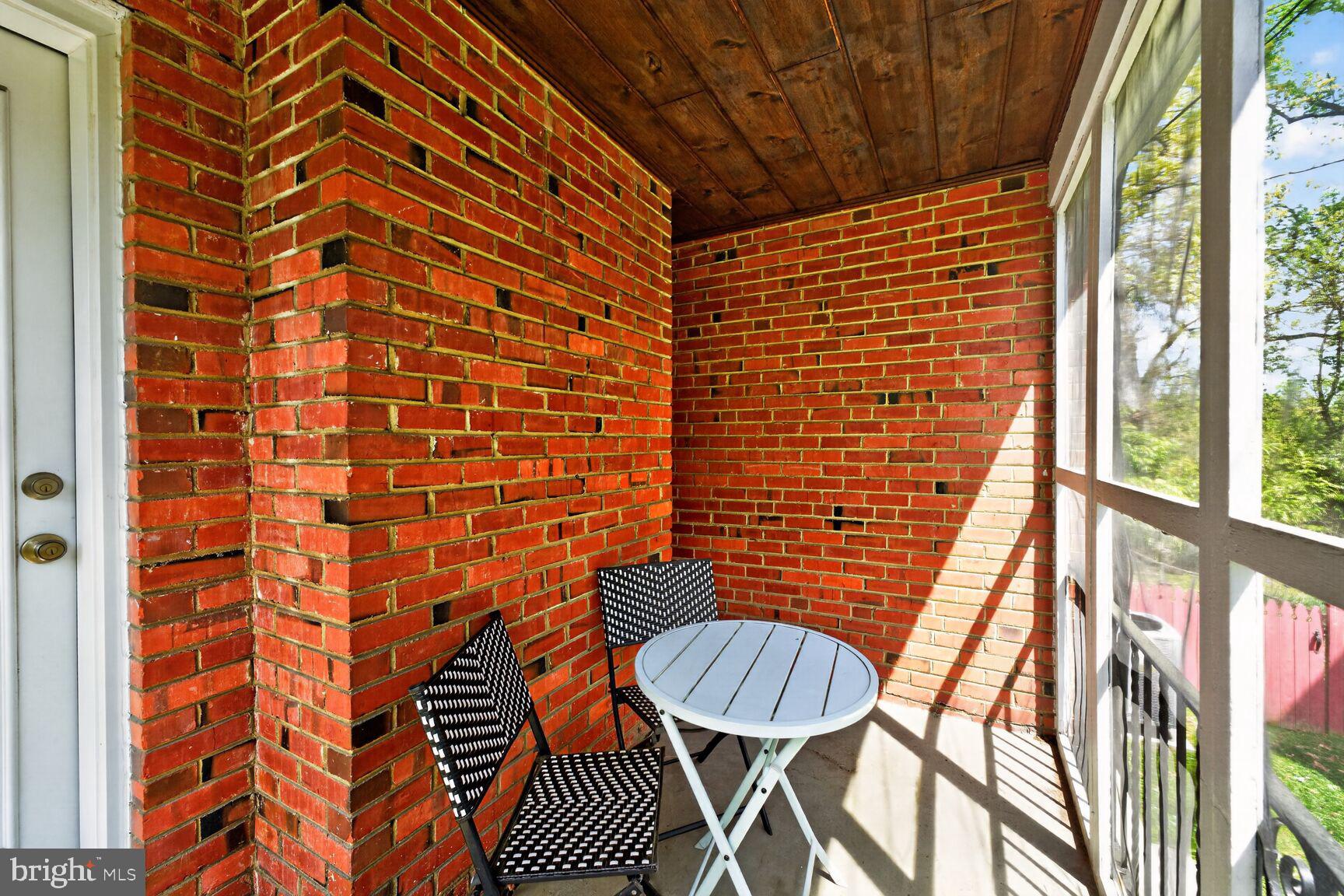617 Gist Avenue Silver Spring, MD 20910 - Photo 26 of 31 Screened-in porch off living room