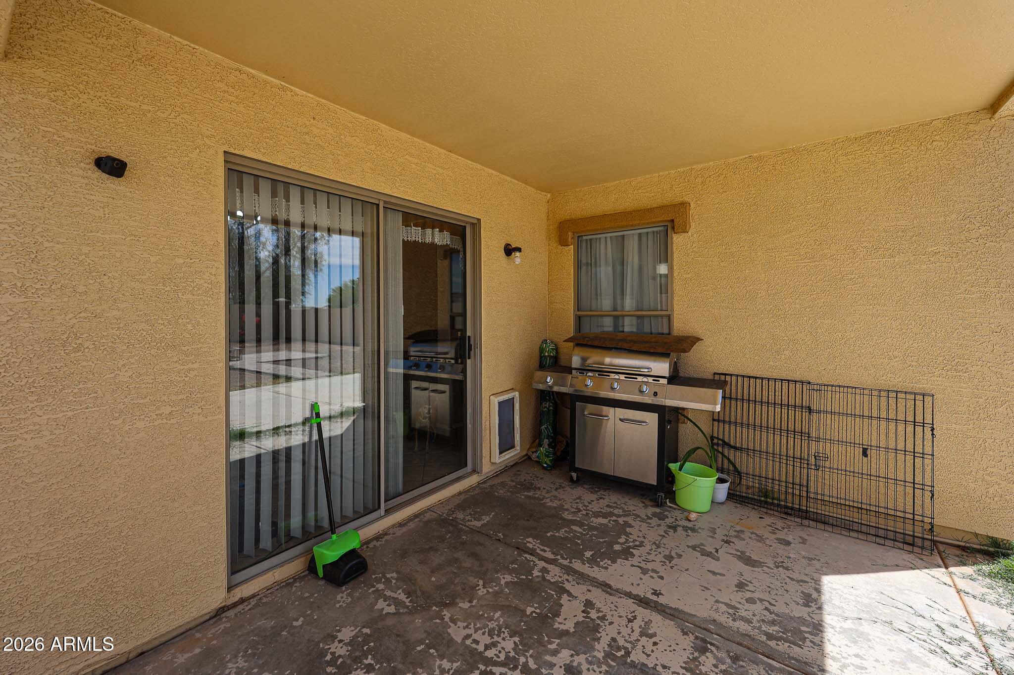 12817 West Sweetwater Avenue El Mirage, AZ 85335 - Photo 26 of 31 Back Patio