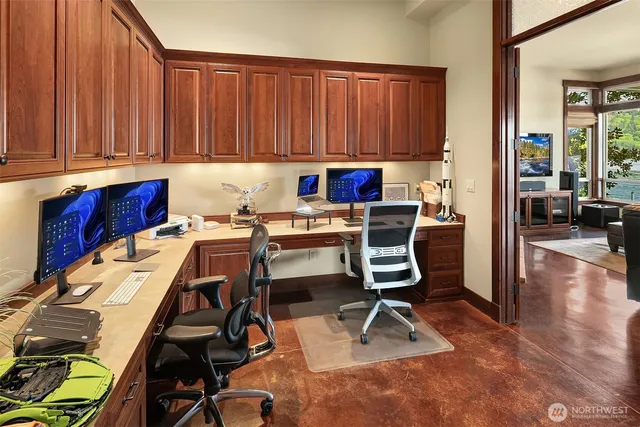 a view of a workspace with furniture and toys