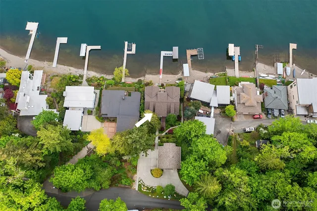 an aerial view of multiple houses with outdoor space