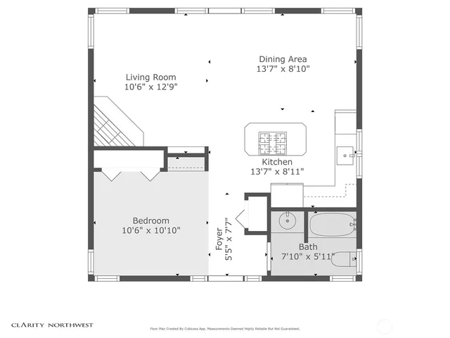 a picture of a bench in front of a wall