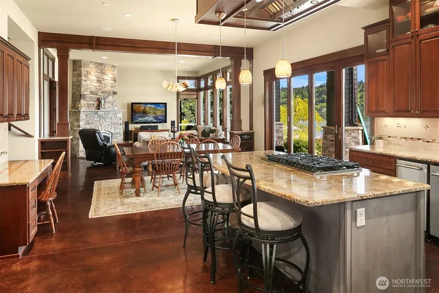 a view of a dining room with furniture and window