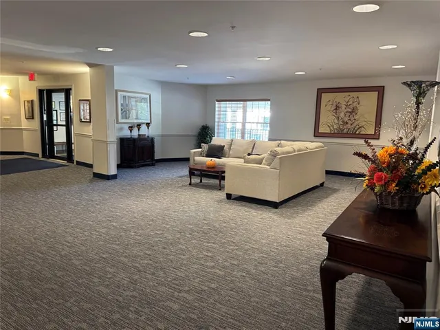 a view of empty room with floor to ceiling window