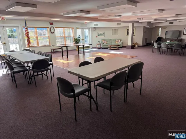a kitchen with stainless steel appliances granite countertop white refrigerator stove a sink and dishwasher