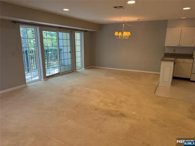 a view of livingroom with kitchen