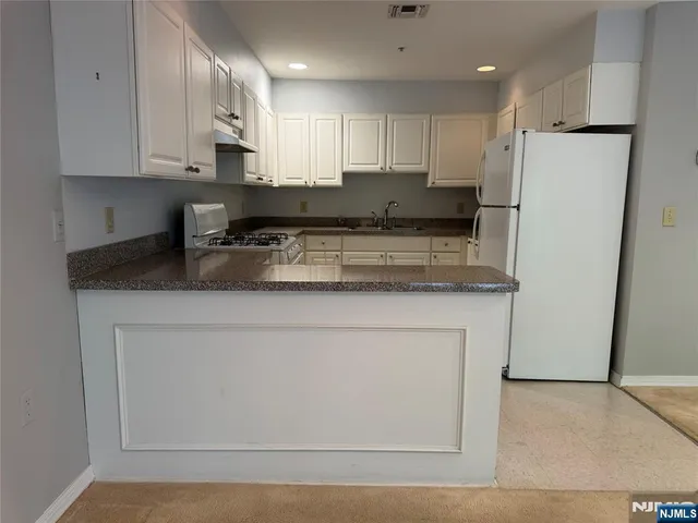 a view of a yard with tree s