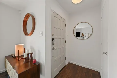 a view of storage and utility room with washer and dryer
