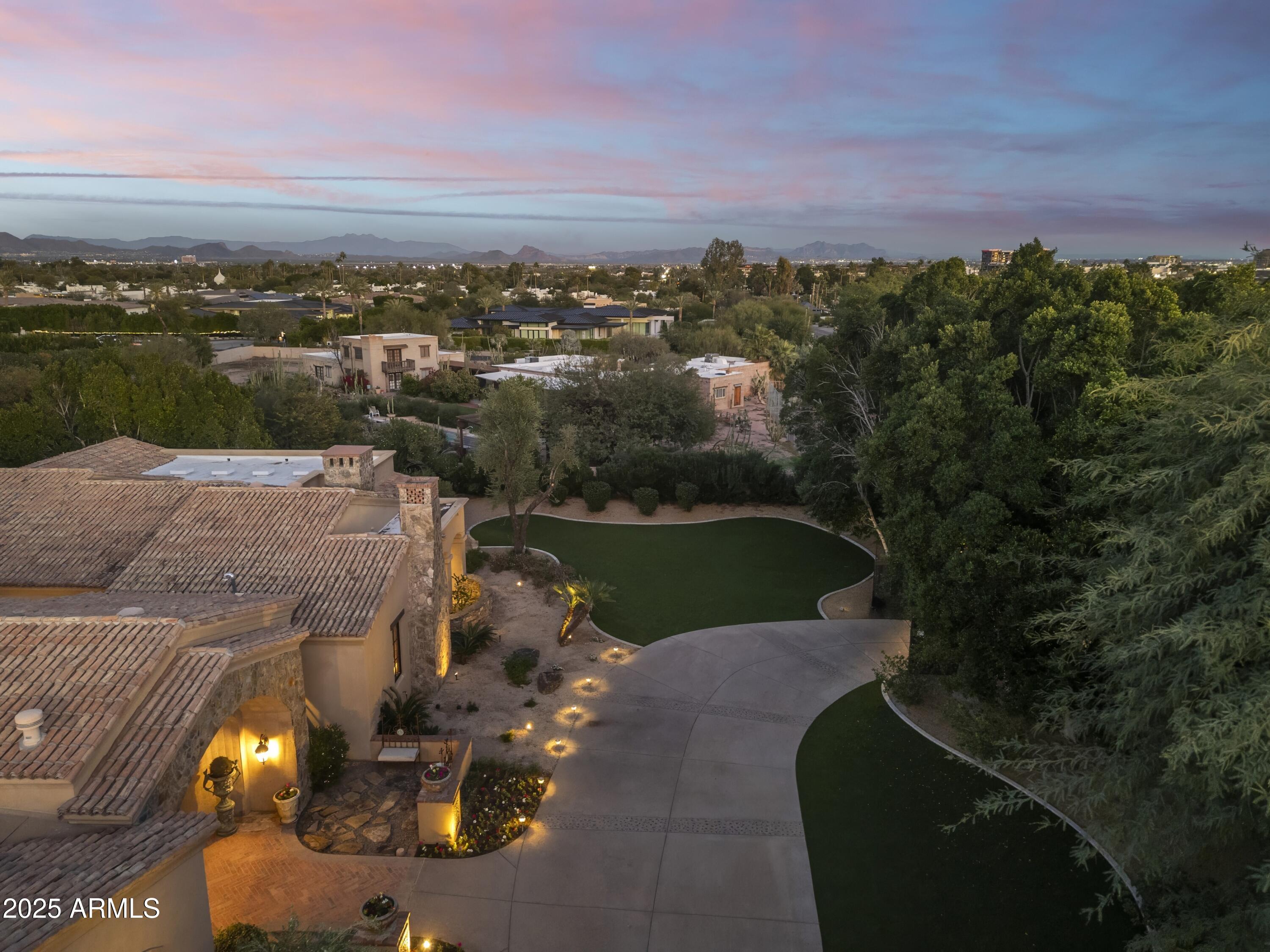 6402 East Chaparral Road Paradise Valley, AZ 85253 - Photo 112 of 125 an aerial view of a house with a lake view
