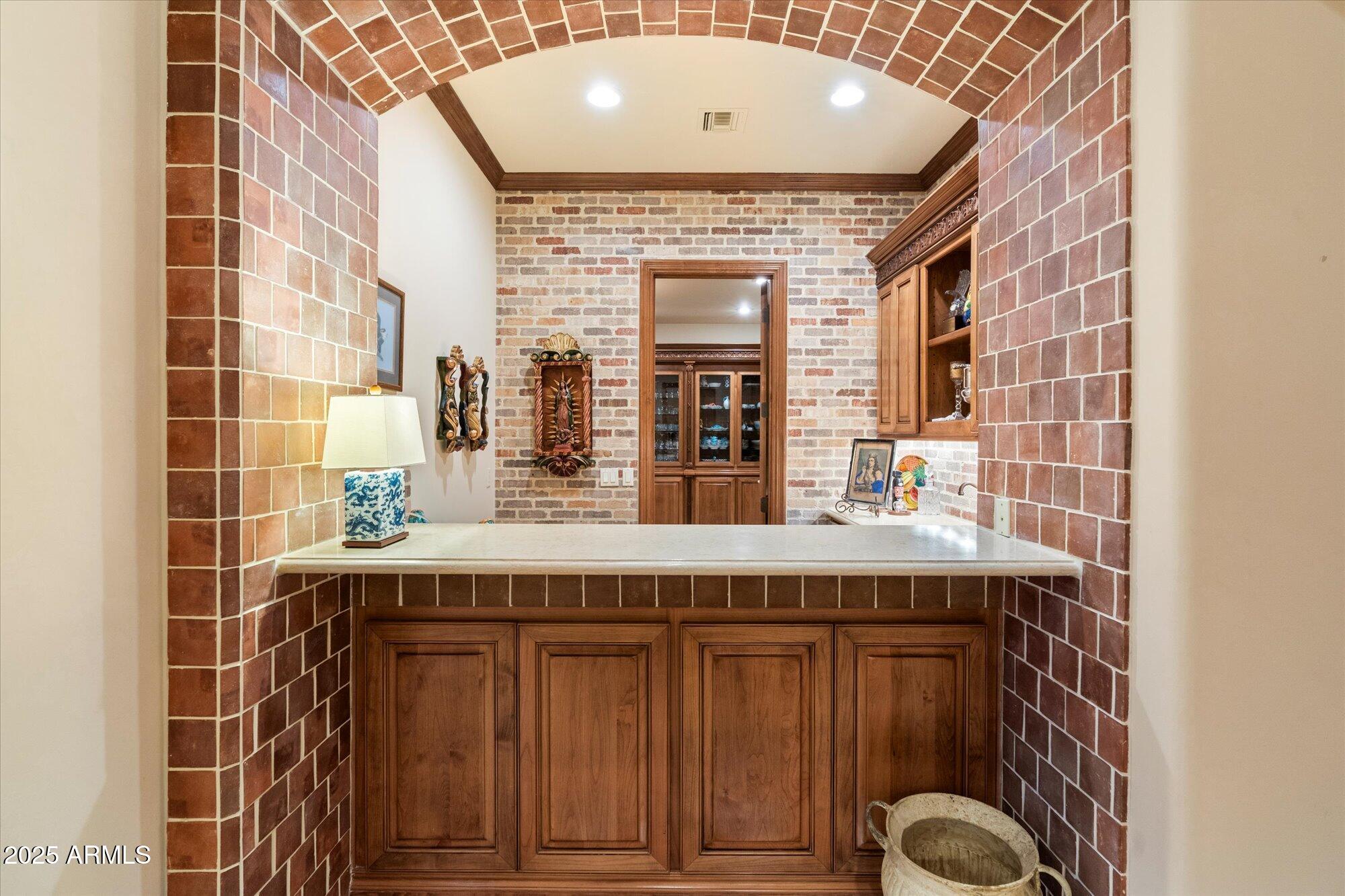 6402 East Chaparral Road Paradise Valley, AZ 85253 - Photo 33 of 125 a bathroom with a granite countertop sink and a mirror