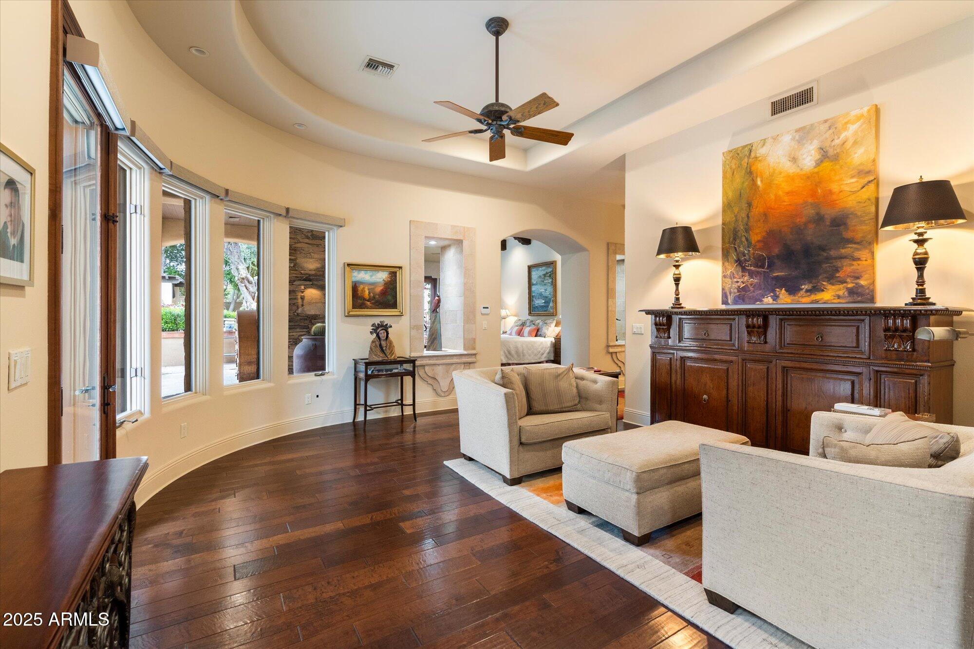 6402 East Chaparral Road Paradise Valley, AZ 85253 - Photo 45 of 125 a living room with furniture and a large window