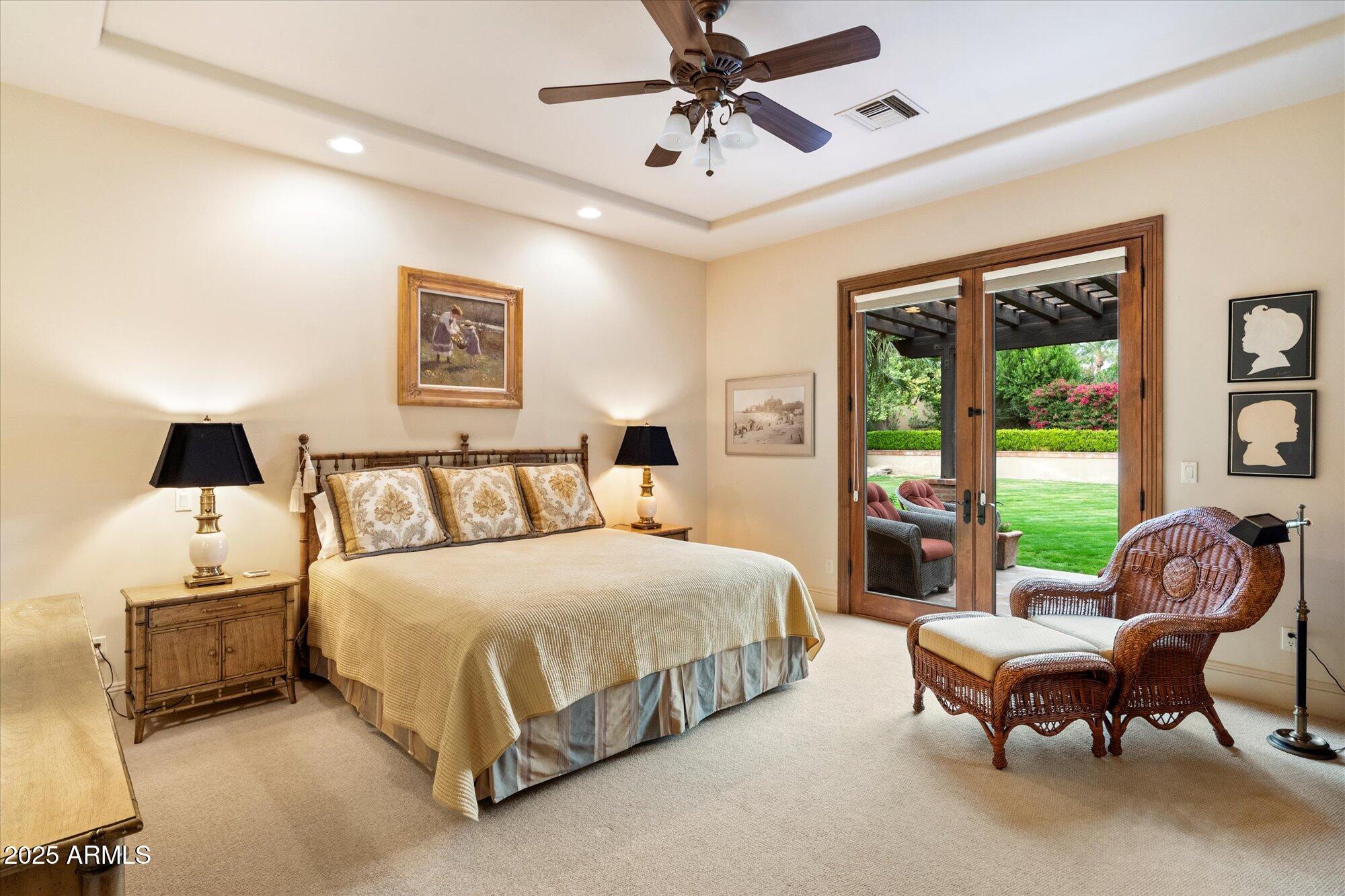 6402 East Chaparral Road Paradise Valley, AZ 85253 - Photo 65 of 125 a spacious bedroom with a bed and a window