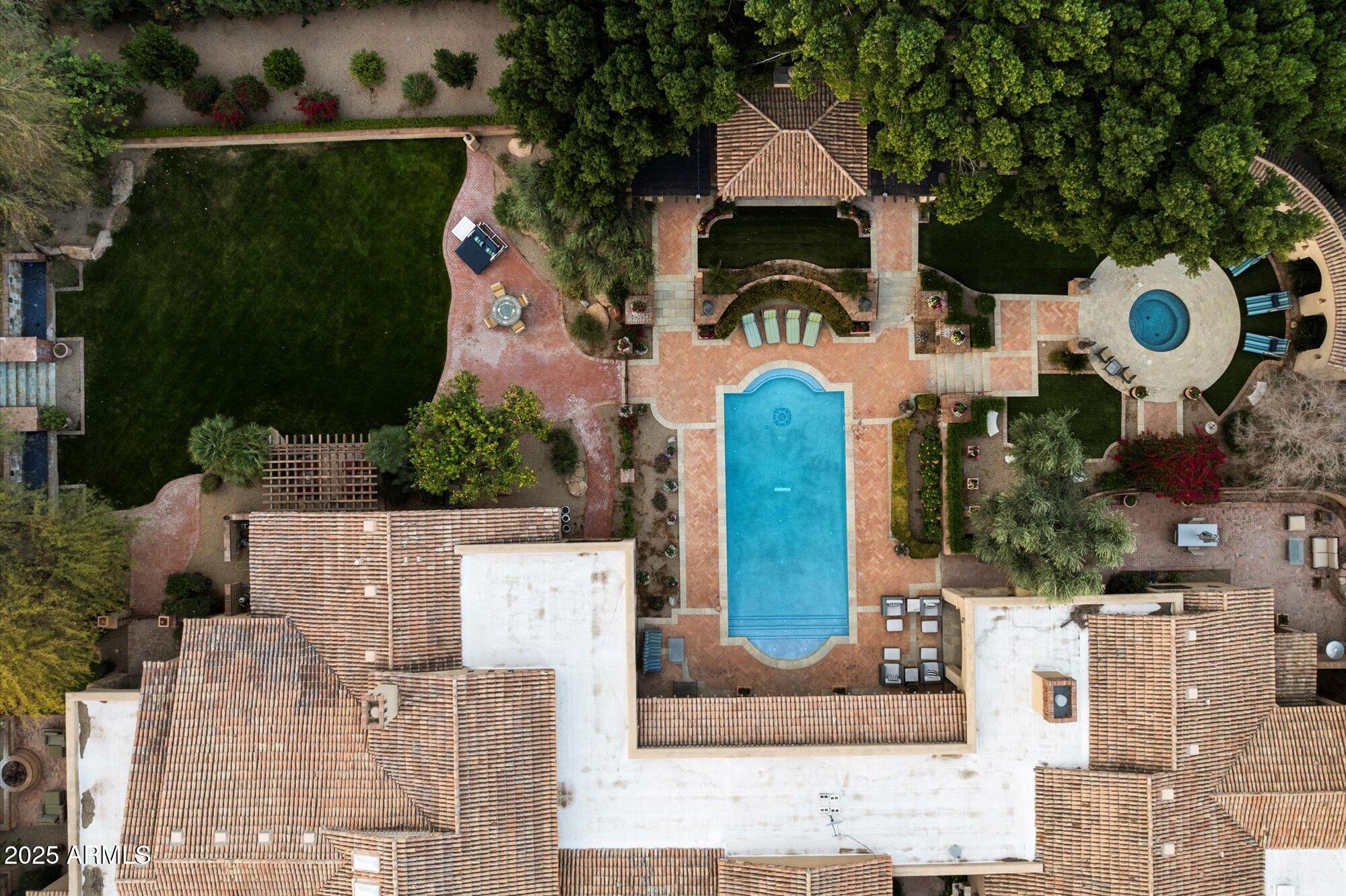 6402 East Chaparral Road Paradise Valley, AZ 85253 - Photo 89 of 125 an aerial view of a house with a swimming pool
