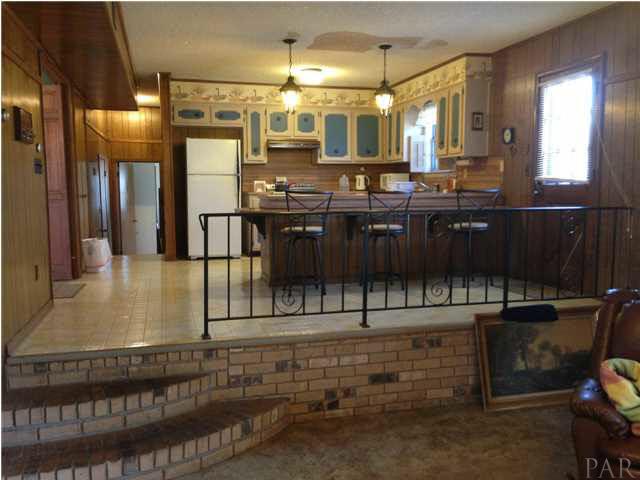 7495 Gunter Road Pensacola, FL 32526 - Photo 5 of 25 Looking from the great room towards the kitchen.