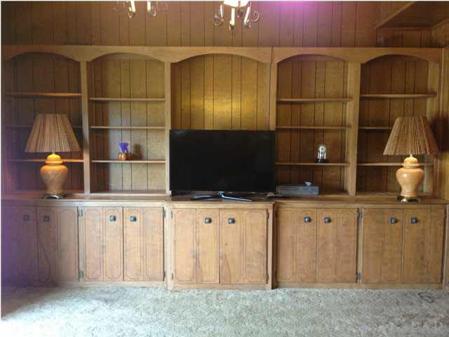 7495 Gunter Road Pensacola, FL 32526 - Photo 8 of 25 Close up view of cabinets and shelving in great room.