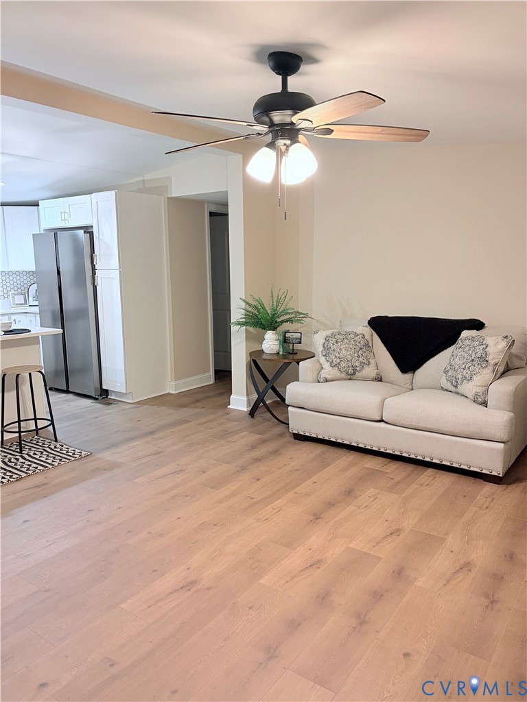 2207 Brodnax Road Brodnax, VA 23920 - Photo 12 of 27 Large and open family room with ceiling fan
