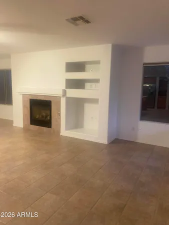 a view of a livingroom with a staircase