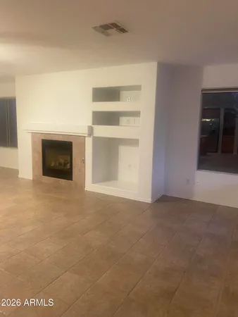 a view of roof deck with patio