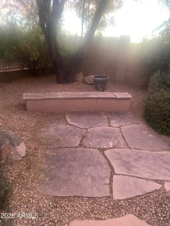 a view of a backyard of a house