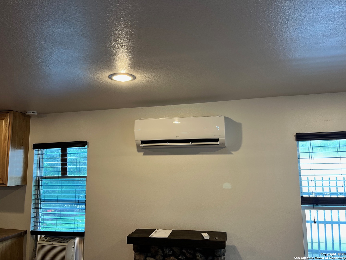 497 Black Bass Road Lakehills, TX 78063 - Photo 48 of 54 a view of entryway and hall with a window