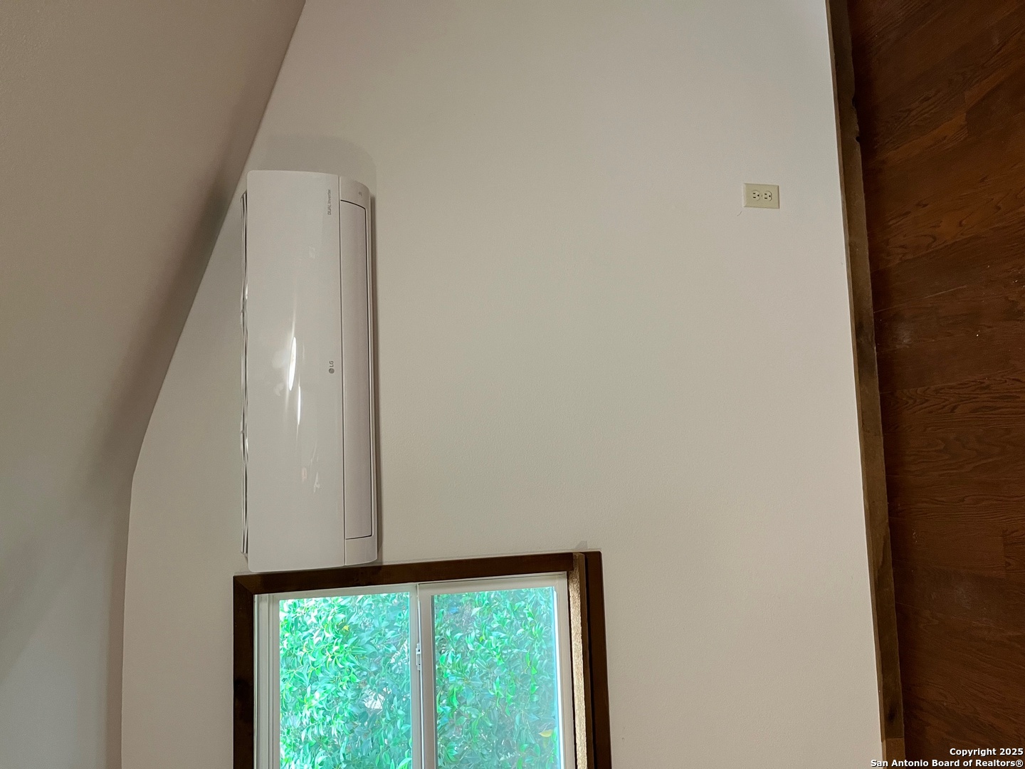 497 Black Bass Road Lakehills, TX 78063 - Photo 53 of 54 a view of an empty room with a window