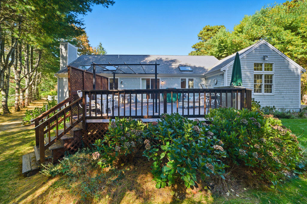 139 Falling Leaf Lane Osterville, MA 02655 - Photo 12 of 40 a house view with a garden space