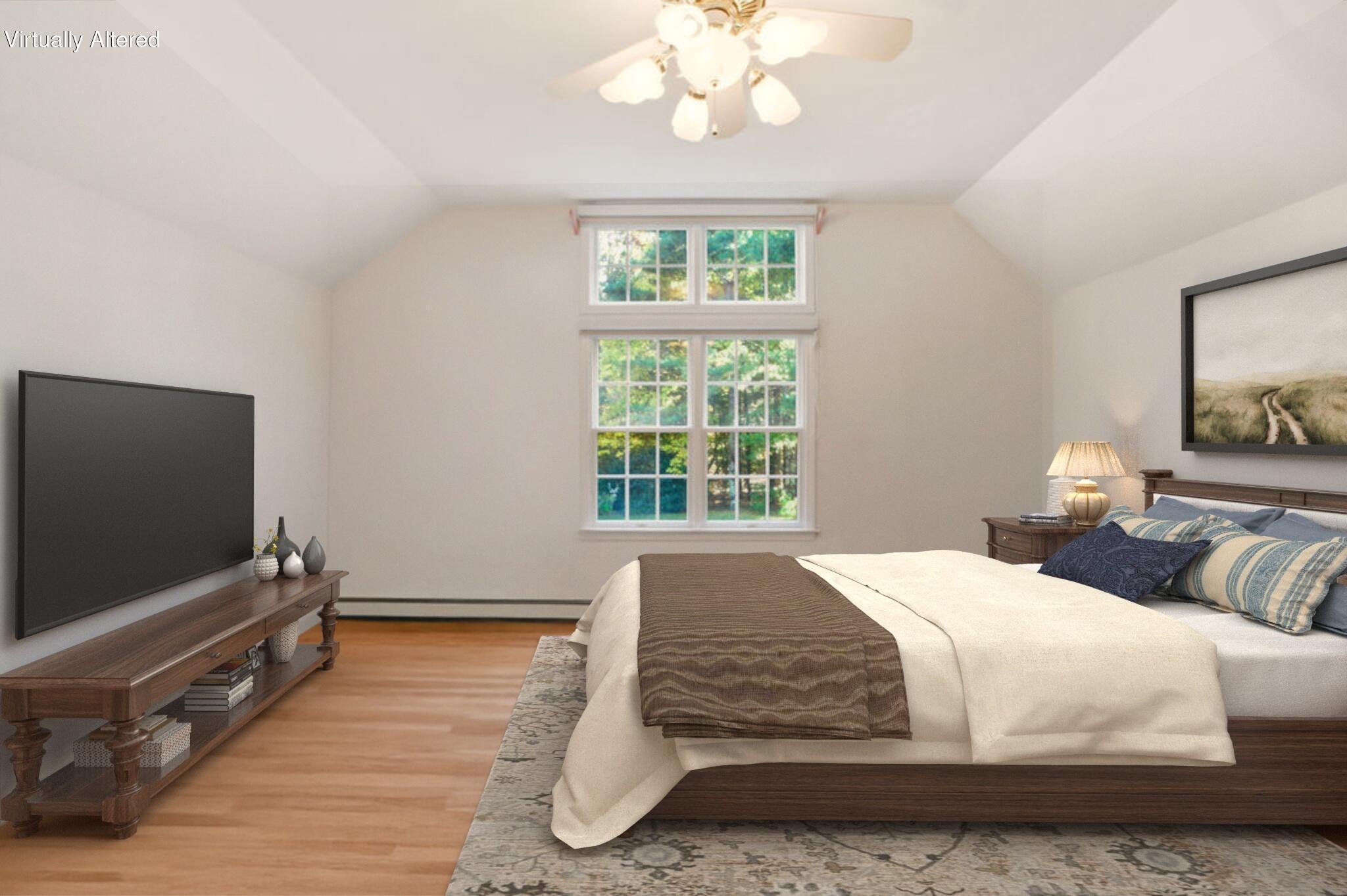 139 Falling Leaf Lane Osterville, MA 02655 - Photo 26 of 40 a bedroom with bed tv and window