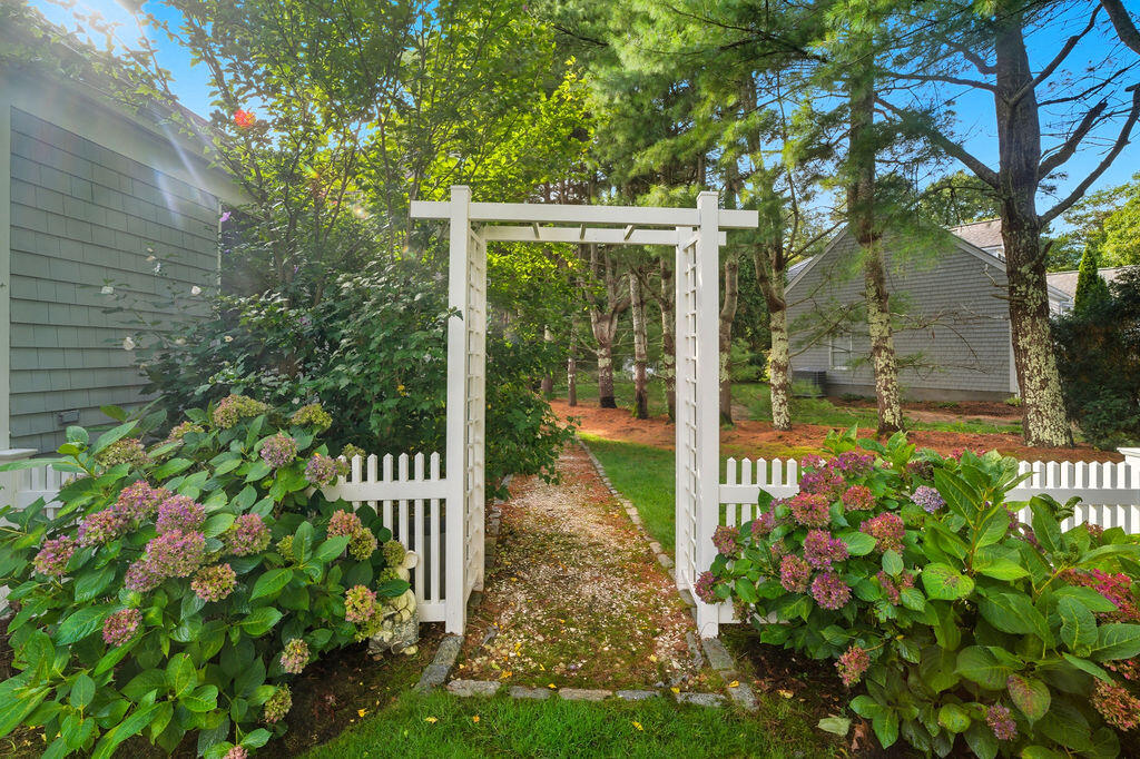 139 Falling Leaf Lane Osterville, MA 02655 - Photo 6 of 40 a view of a garden