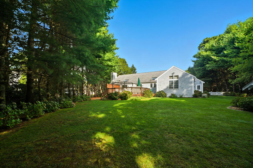 139 Falling Leaf Lane Osterville, MA 02655 - Photo 7 of 40 a view of a house with backyard