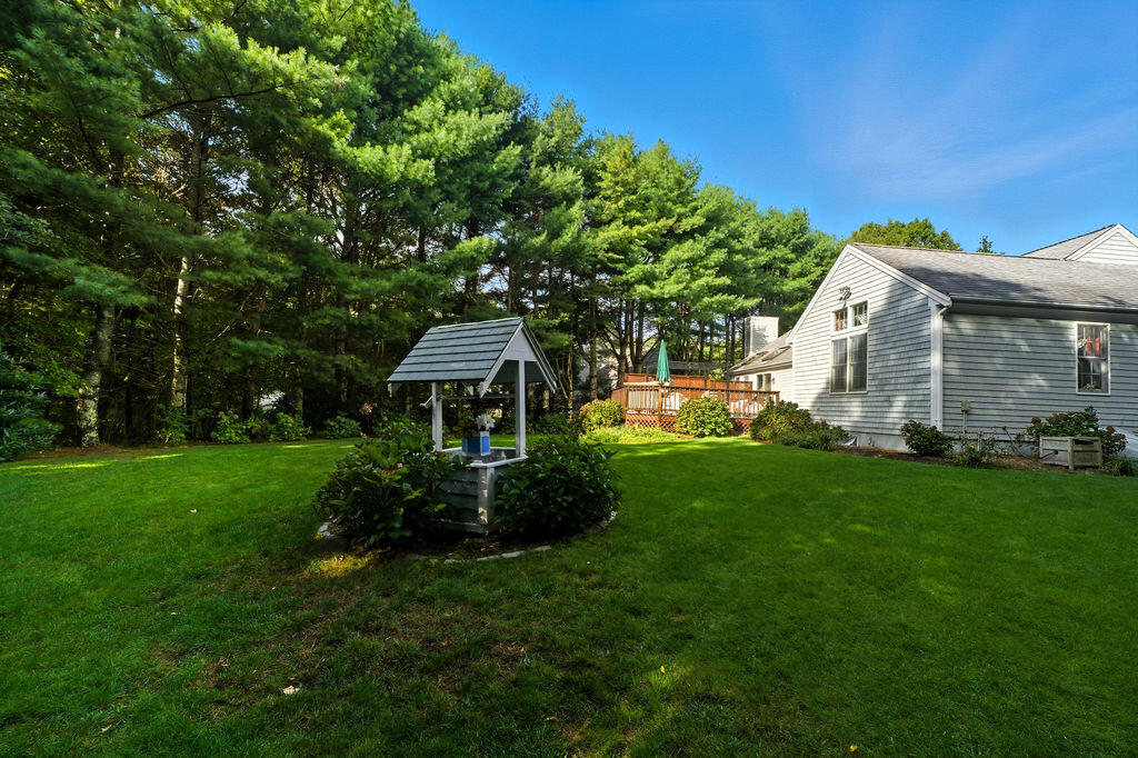 139 Falling Leaf Lane Osterville, MA 02655 - Photo 8 of 40 a front view of a house with a garden
