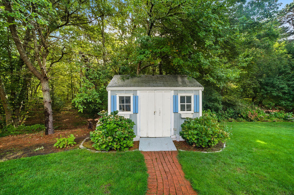 139 Falling Leaf Lane Osterville, MA 02655 - Photo 9 of 40 a front view of a house with a yard