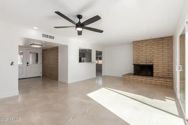 a view of a livingroom with a staircase