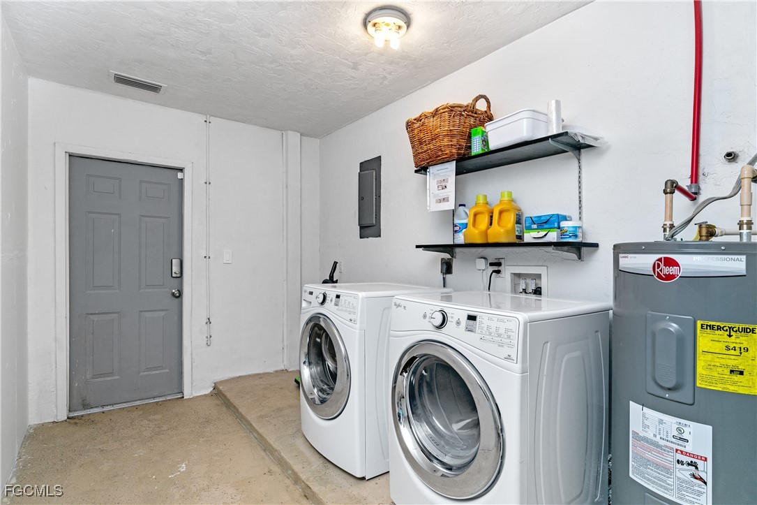 3717 Hanover Street Fort Myers, FL 33901 - Photo 25 of 41 a view of storage and utility room with washer and dryer