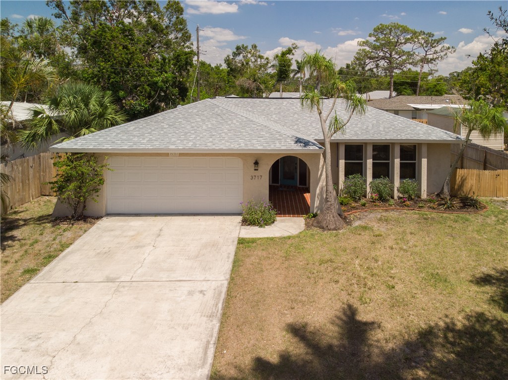 3717 Hanover Street Fort Myers, FL 33901 - Photo 30 of 41 front view of a house with a yard