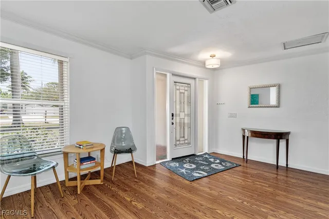 a view of dining room and wooden floor