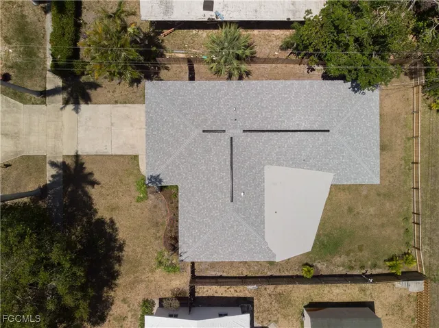 a terrace with outdoor seating and city view