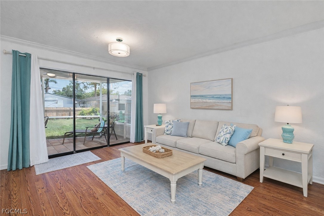 3717 Hanover Street Fort Myers, FL 33901 - Photo 6 of 41 a living room with furniture and a large window