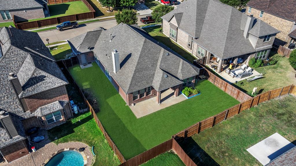 1102 Brigham Drive Forney, TX 75126 - Photo 2 of 25 an aerial view of a house with garden