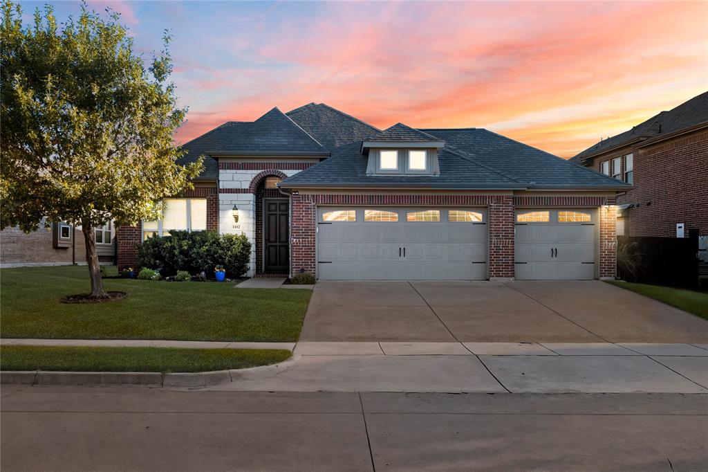 1102 Brigham Drive Forney, TX 75126 - Photo 5 of 25 front view of a house with a yard