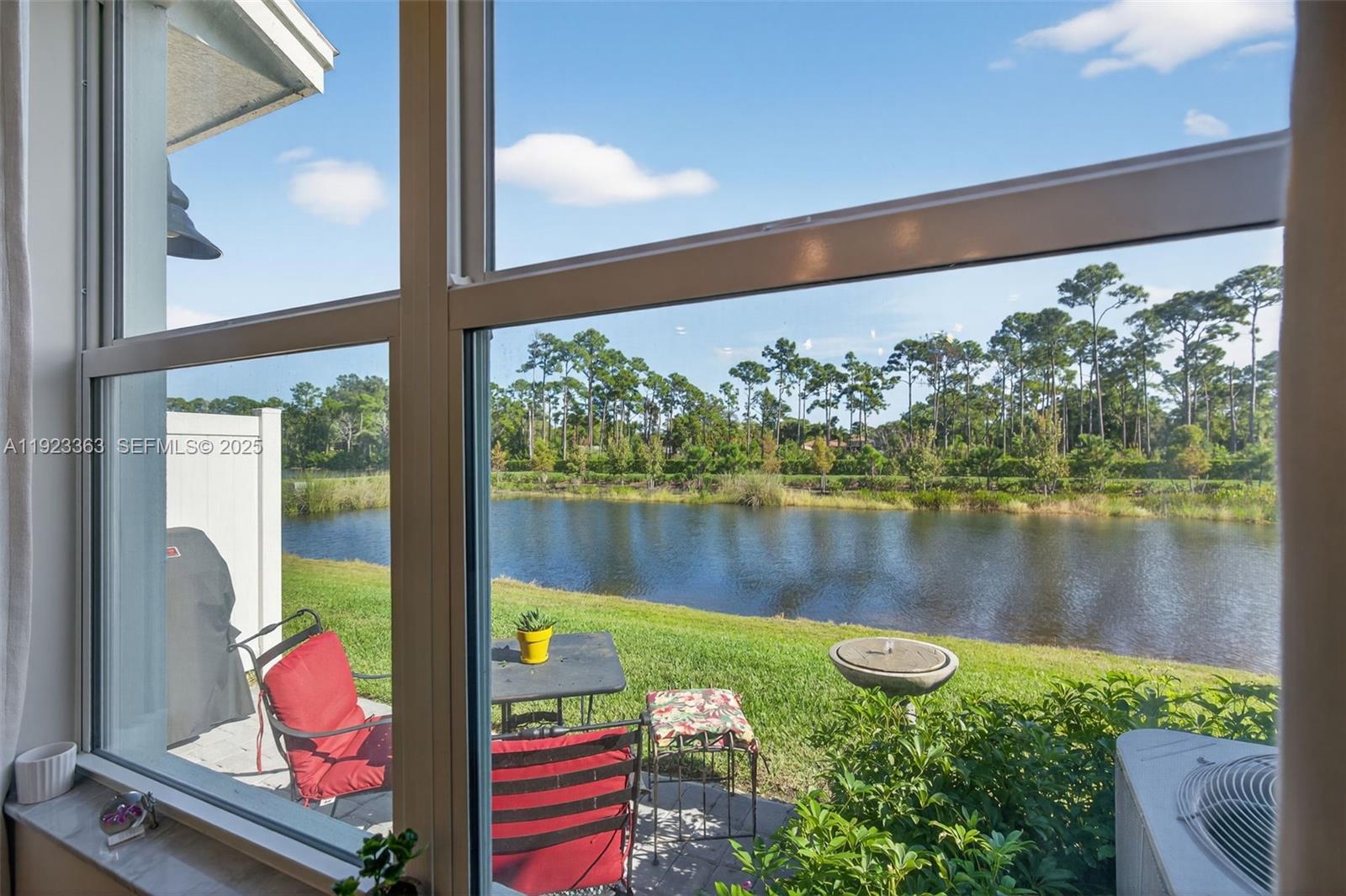 5746 Southeast Edgewater Circle Stuart, FL 34997 - Photo 13 of 38 a view of swimming pool from a balcony
