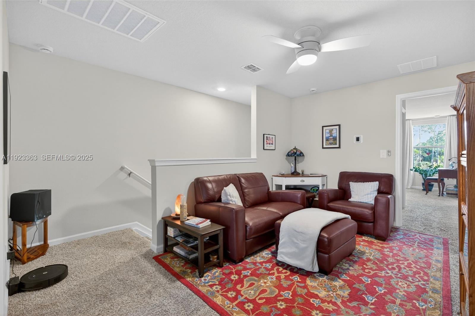 5746 Southeast Edgewater Circle Stuart, FL 34997 - Photo 17 of 38 a living room with furniture