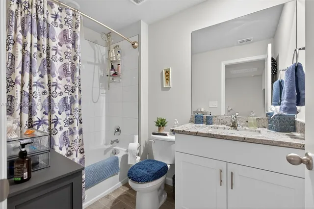 a bed room with a bed and a table