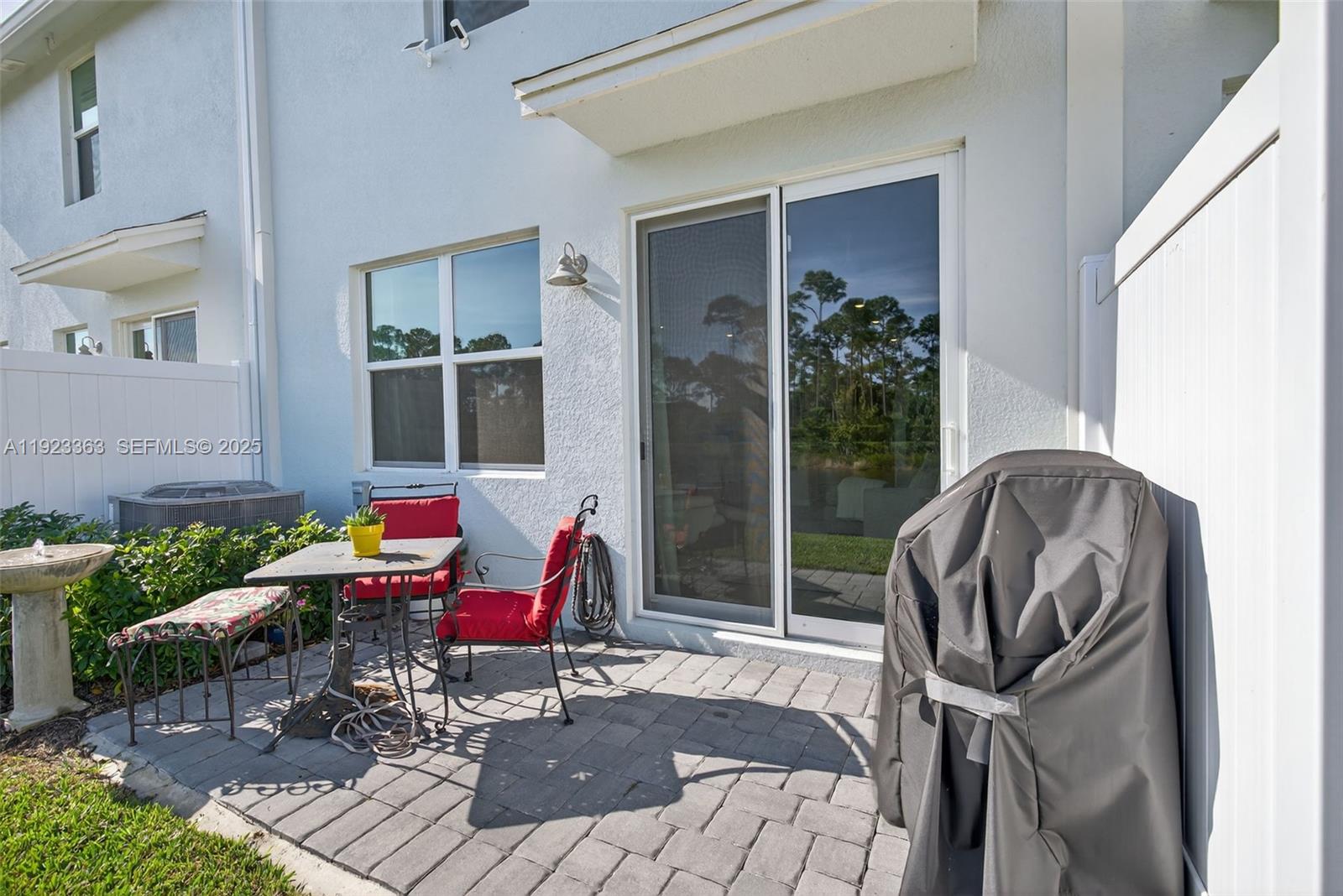 5746 Southeast Edgewater Circle Stuart, FL 34997 - Photo 29 of 38 a building outdoor space with patio furniture