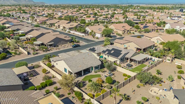 an aerial view of a house with a outdoor space