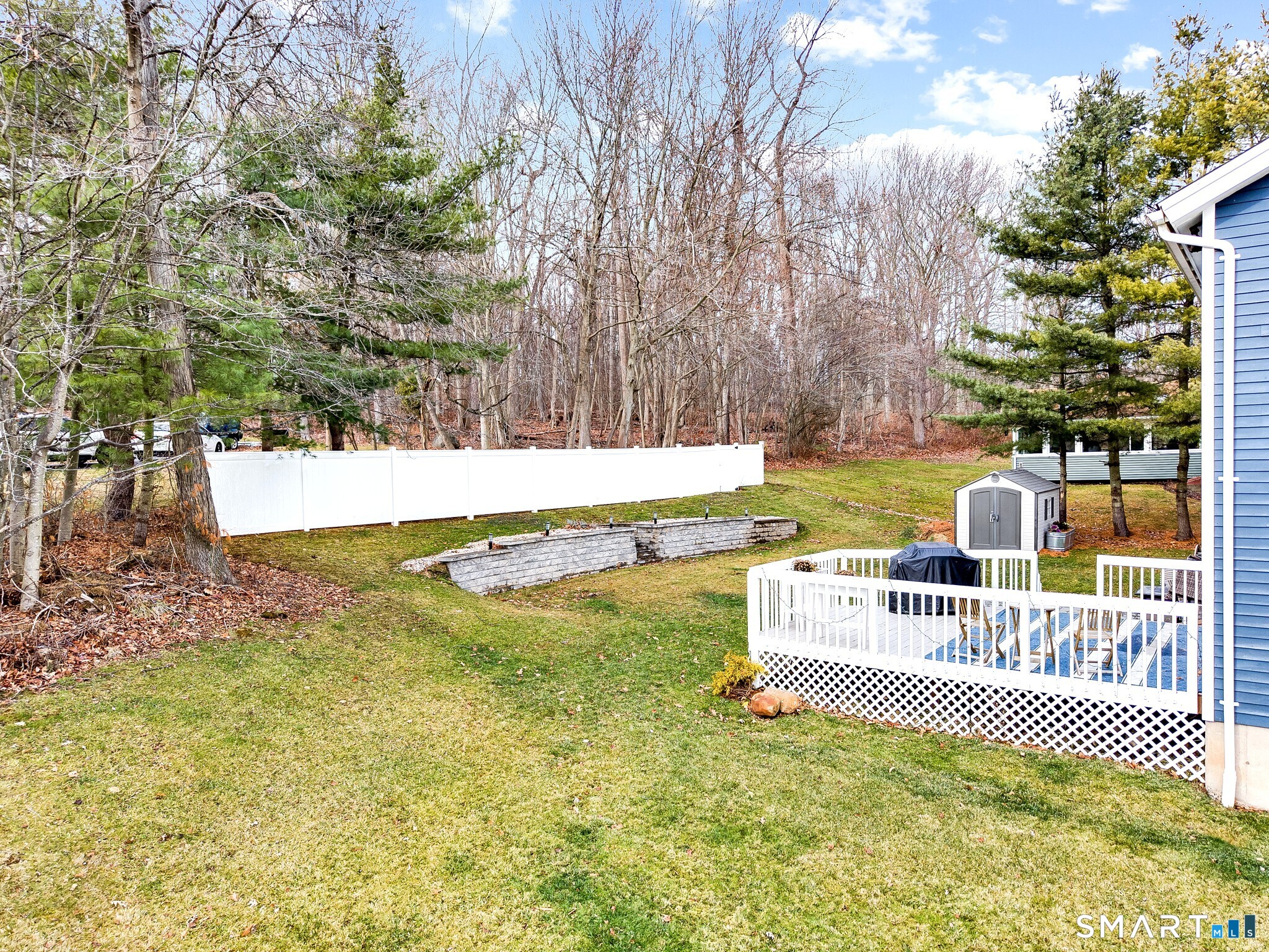22 Harnish Lane Wallingford, CT 06492 - Photo 23 of 27 Beautiful Retainer Wall enhances by Privacy Fence